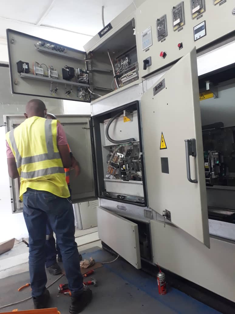 Engineer working on MV switchgear panel
